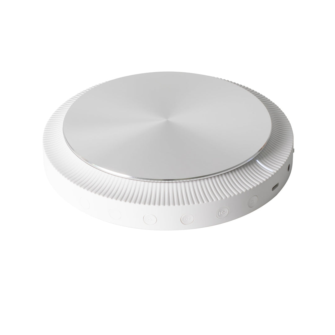 Angled view of the Trettitre Bluetooth CD player, showcasing its refined form and Golden Pin Design Award–winning design.